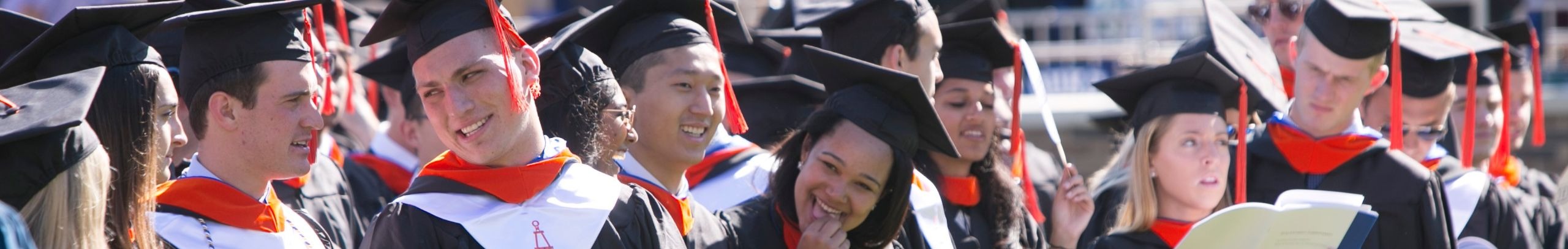 students in regalia at commencement