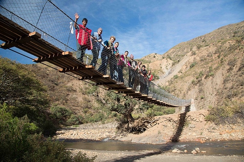 DEID students on a bridge in Bolivia