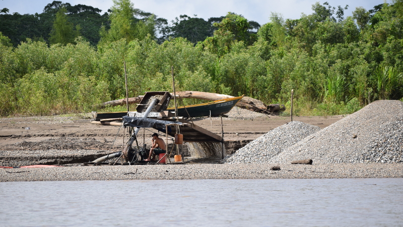 lean-to small scale gold mining by a river